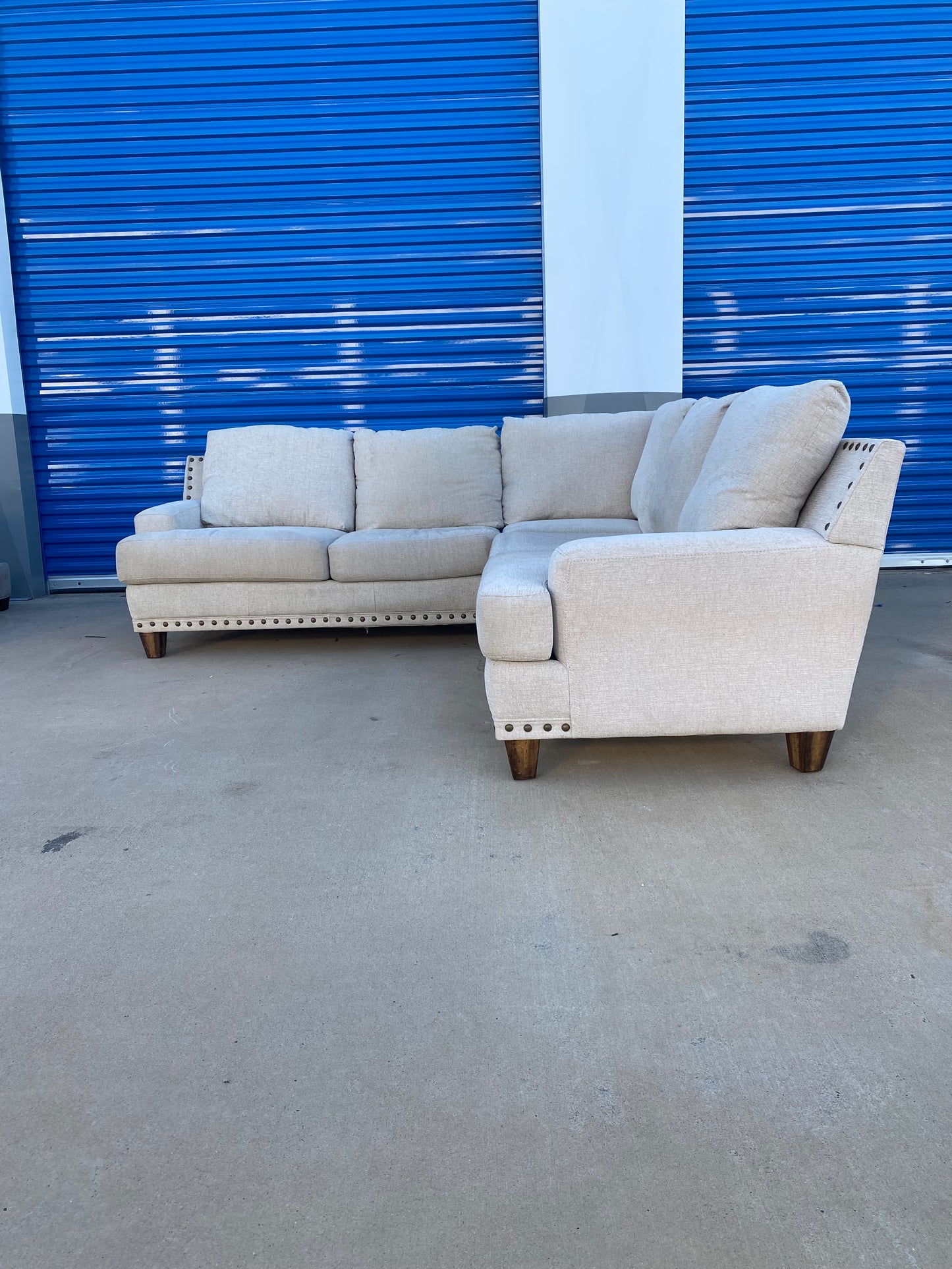 Beige Nail Head Sectional Couch