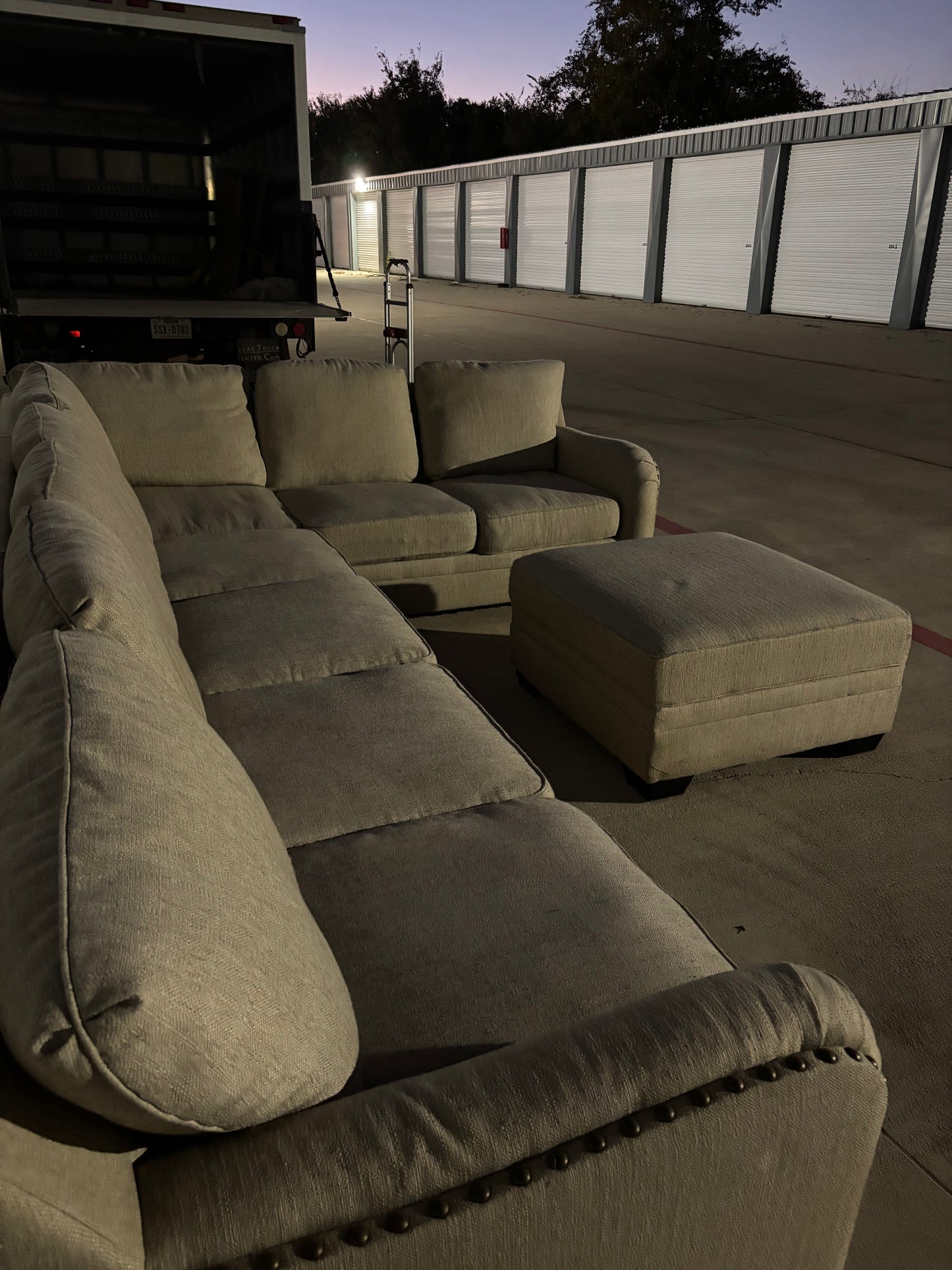 Beautiful Large Beige Sectional with Storage Ottoman