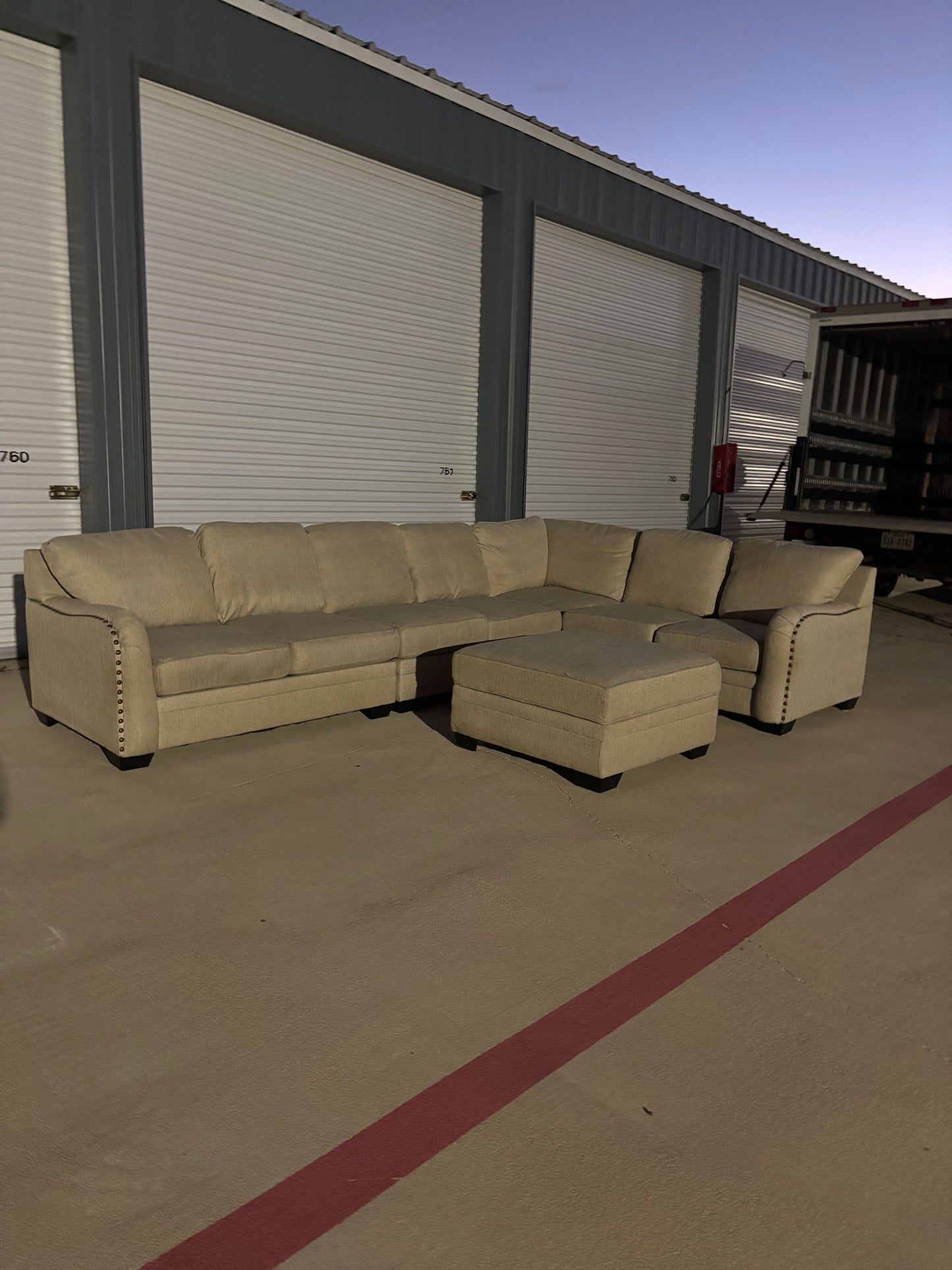 Beautiful Large Beige Sectional with Storage Ottoman